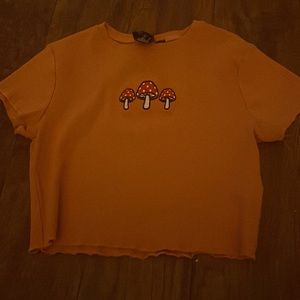 Orange mushroom crop top
